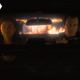 Two people in a car at night.